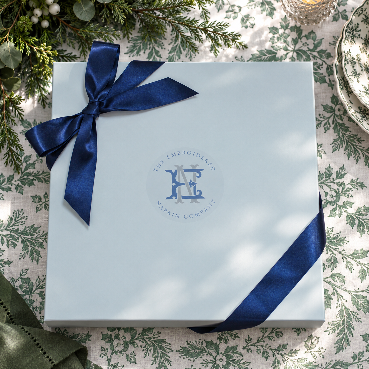 Christmas gift box on Green cloth