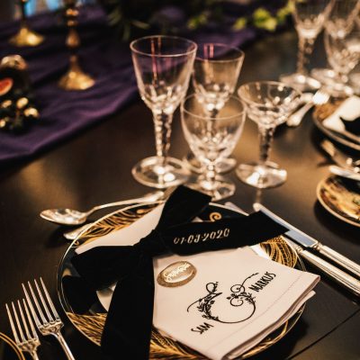 Black and Gold Opulent Table Styling With Personalised Linen Napkins