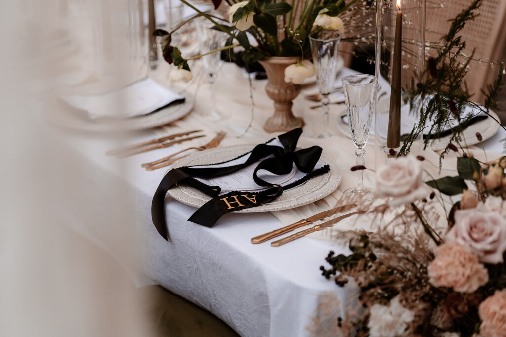 Luxury Wedding Tablescape With Personalised Napkin Bows at Avington Park