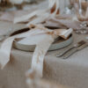 TEXTURED NEUTRAL WEDDING featuring embroidered satin ribbon bows