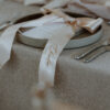 TEXTURED NEUTRAL WEDDING featuring embroidered satin ribbon bows